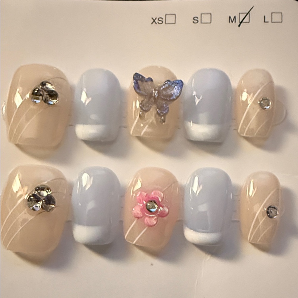 Elegant Nail Art Set with  3D Butterfly, heart and Flower Accents. French tip.